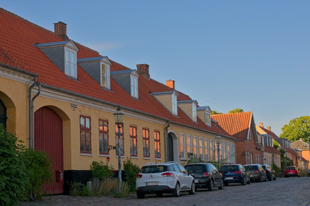 Children playing together in a quiet Danish residential street